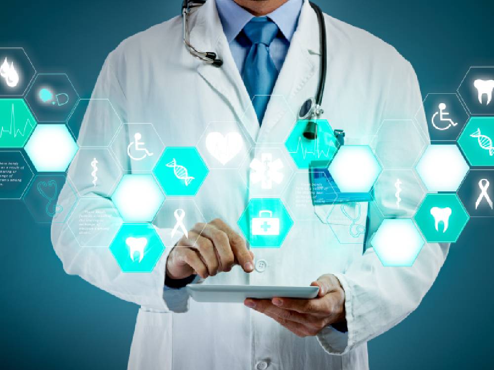 Doctor consulting patient at Modern E-Health Care
